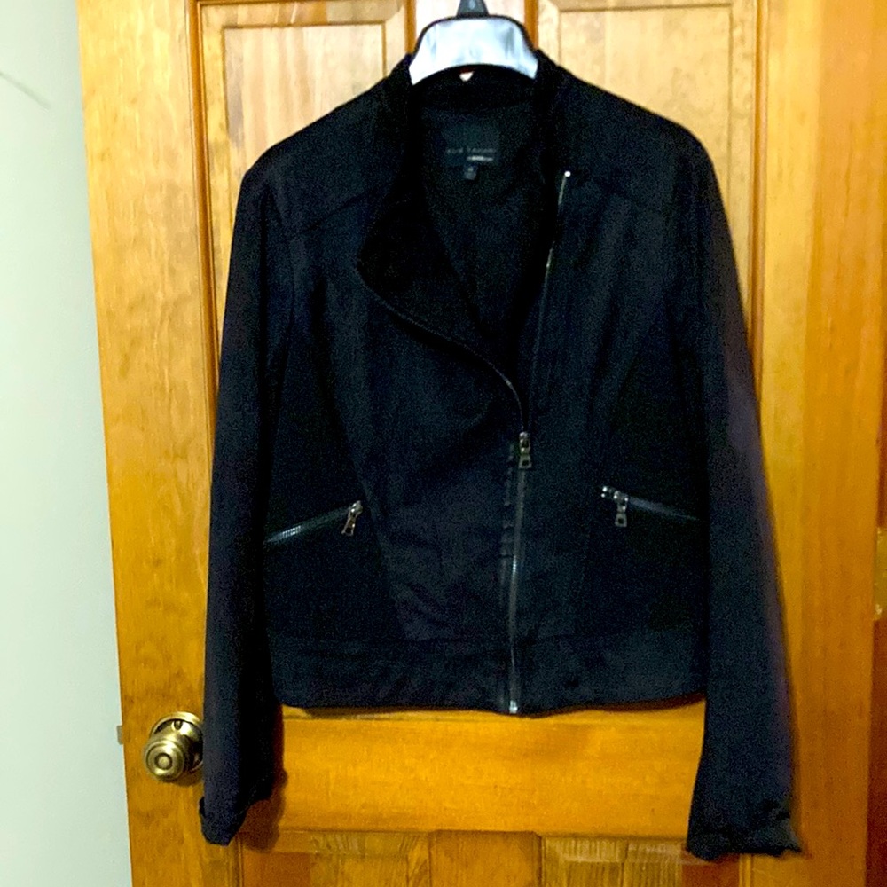 Asymmetrical front zipper in black ultra suede jacket.  Fully lined.